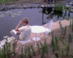 reading-by-pond